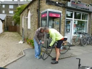 Ade checks Spenna's tire pressure at Nenthead