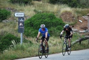 Coxy and Roly summit the Col de Bastiano