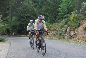 Coxy leads Roly up the Col de Bergia