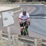 Johnny G climbs up towards Cala Gonone