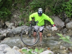 Roly fords the river on route to Ovaro